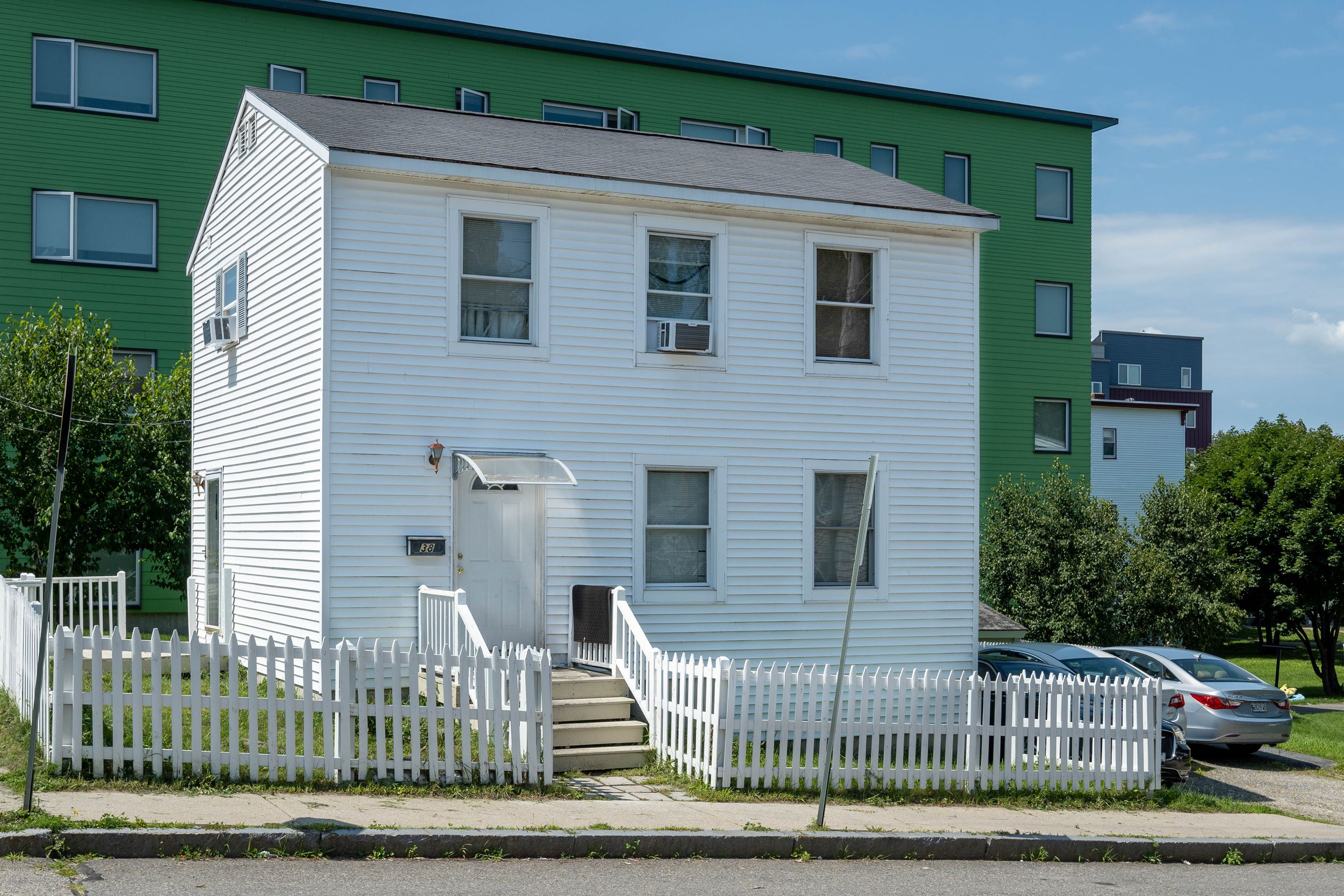 Front View of 38 Mayo Street, two-story, white, single family home